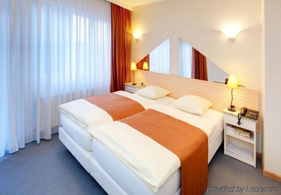 City Hotel Luxemburgo Quarto foto