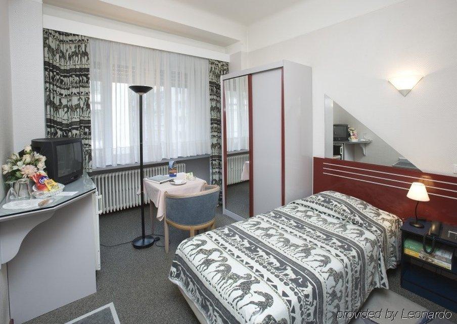 City Hotel Luxemburgo Quarto foto